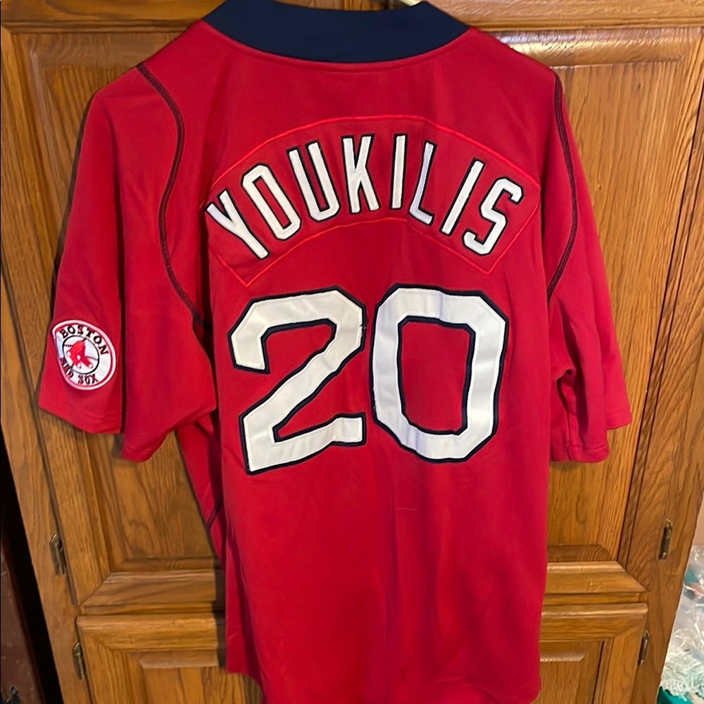 Nike Red Jersey with Short Sleeves and Pullover Design